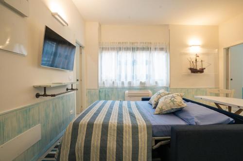Postel nebo postele na pokoji v ubytování IL GALEONE Rapallo