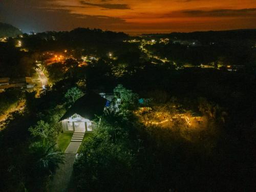 an aerial view of a house at night at Tardes Doradas in Quepos