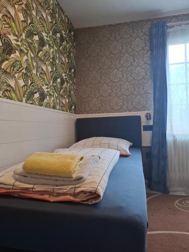 B&B Waldblick Hotel mit großem Parkplatzにあるベッド