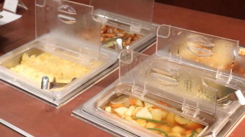 three plastic containers of food sitting on a counter at Tokyo Inn - Vacation STAY 26671v in Tokyo