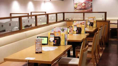 a row of tables in a fast food restaurant at Tokyo Inn - Vacation STAY 26704v in Tokyo