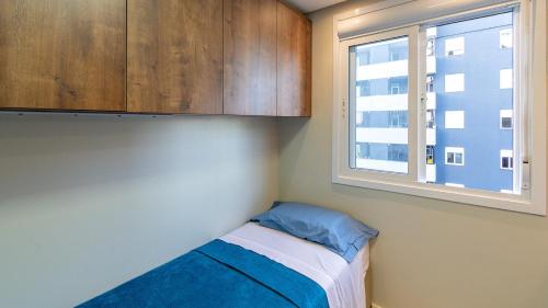 Кровать или кровати в номере Apartamento moderno e bem localizado em Canoas!