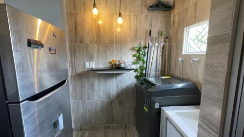 Kuchyň nebo kuchyňský kout v ubytování Apartamento Coveñas