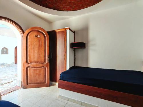 Postel nebo postele na pokoji v ubytování Ghzala hotel dahab