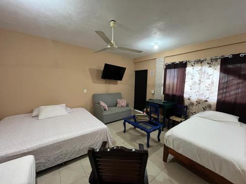 Ένα ή περισσότερα κρεβάτια σε δωμάτιο στο La Puerta del Sol