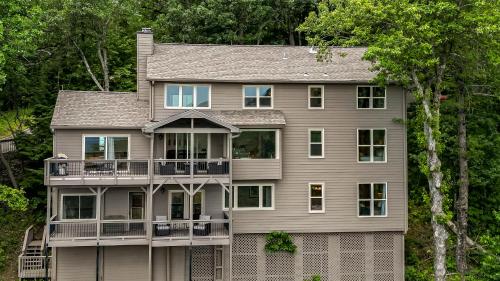 a large gray house with a large balcony at Southern Views in Jasper