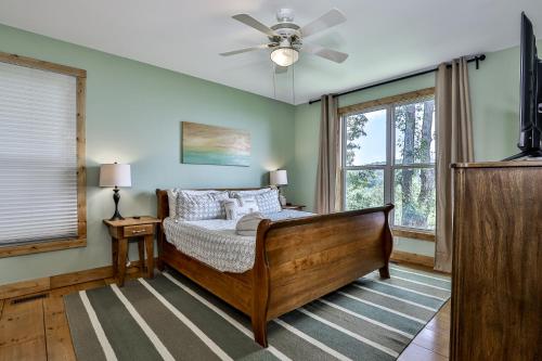 a bedroom with a bed and a ceiling fan at Southern Views in Jasper