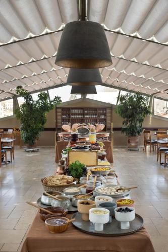 a buffet of food on a table in a building at Armada Istanbul Old City Hotel in Istanbul