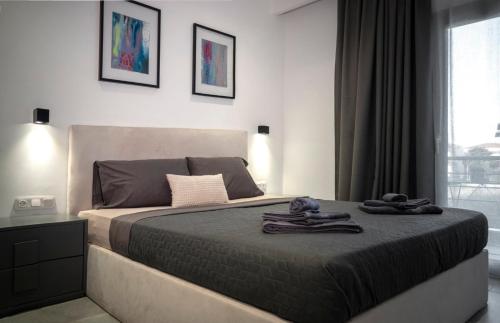Ένα ή περισσότερα κρεβάτια σε δωμάτιο στο Berries Luxury Apartments
