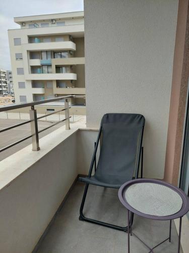 Balkonas arba terasa apgyvendinimo įstaigoje TiN Apartment