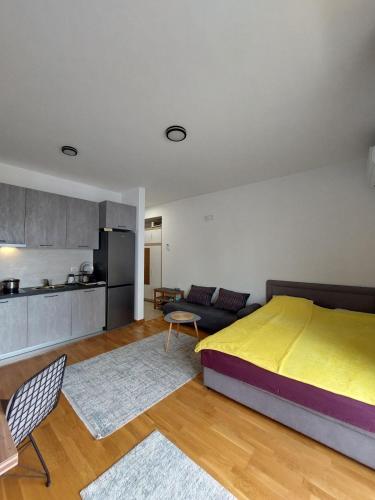 Kuchyň nebo kuchyňský kout v ubytování TiN Apartment
