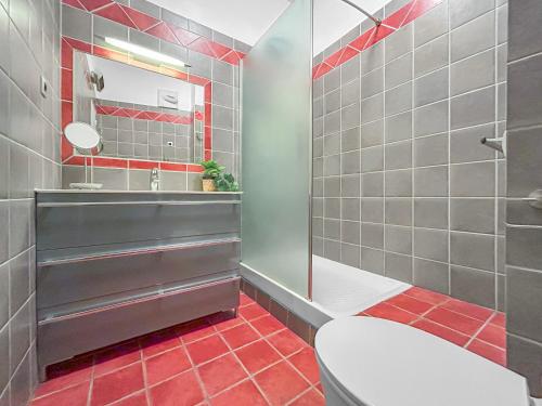 a bathroom with a toilet and a sink at Séjour authentique en plein centre d Avignon in Avignon