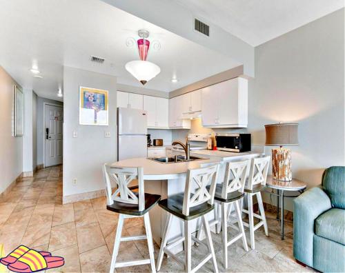 a kitchen with a table and chairs in a room at Highly Desired 6th Floor 1 BR Oceanfront - There Is Only One Ocean Walk Resort 606 in Daytona Beach