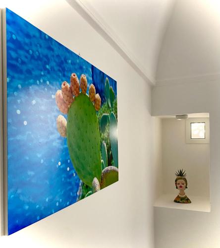 a painting of a cactus on a wall at Dal Maestro Bed&Comfort in Gioia del Colle