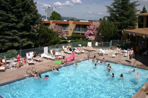 a group of people in a swimming pool at Mirabeau Park Hotel in Spokane Valley