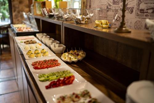 a buffet line with many different types of food at Grand Częstochowa in Częstochowa