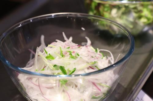 a glass bowl filled with coleslaw at Dormy Inn Matsumoto in Matsumoto