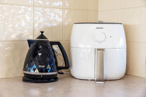 a white toaster sitting on top of a kitchen counter at McGill Vineyard Barossa in Lights Pass