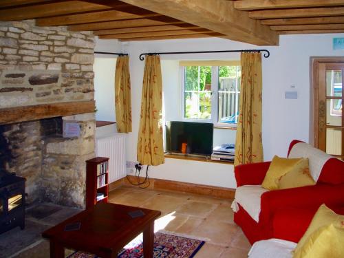TV a/nebo společenská místnost v ubytování Ivy Cottage