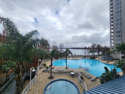 arial view of a swimming pool in a resort at Orlando 1st Floor - 5 min Disney in Orlando