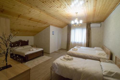 Ένα ή περισσότερα κρεβάτια σε δωμάτιο στο Andro House