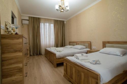 Ένα ή περισσότερα κρεβάτια σε δωμάτιο στο Andro House