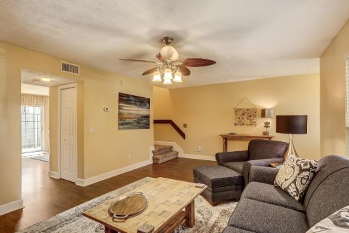 a living room with a couch and a table at Fernandina Shores Condo in Fernandina Beach
