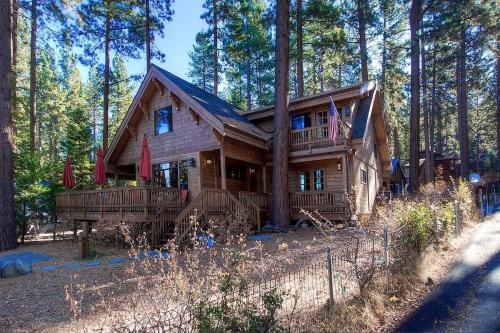 a large wooden house in the woods at Smokey Joes cabin in Zephyr Cove