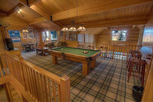 a large room with a pool table in a cabin at Smokey Joes cabin in Zephyr Cove