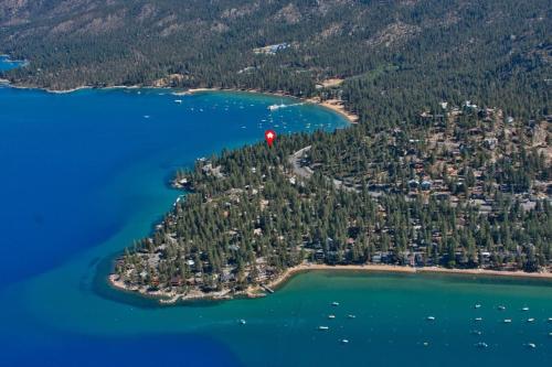 an island with a red flag on it in the water at Smokey Joes cabin in Zephyr Cove