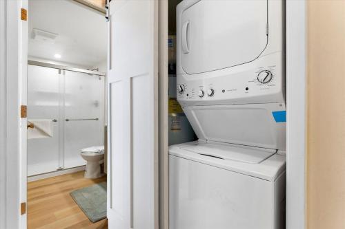 a white washer and dryer in a bathroom at Raccoon Roost condo in Incline Village