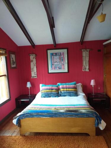 Ein Bett oder Betten in einem Zimmer der Unterkunft Casona Pidenco, 3km de curacautín