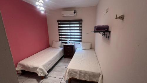 Postel nebo postele na pokoji v ubytování Casa con alberca y entrada independiente