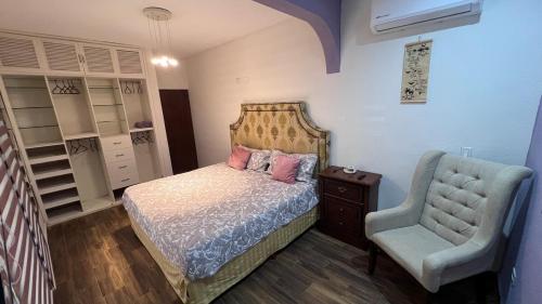 Postel nebo postele na pokoji v ubytování Casa con alberca y entrada independiente