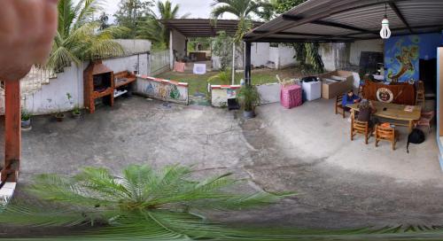 a patio with a table and chairs and a tent at Zumag Sisa in Tena