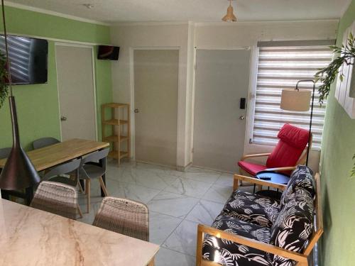 Μια τηλεόραση ή/και κέντρο ψυχαγωγίας στο Casa con dos cómodas habitaciones