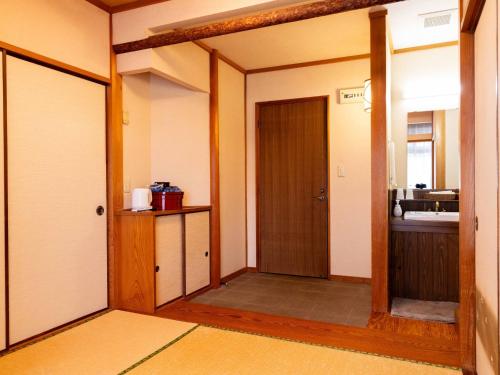 Una cocina o zona de cocina en 明石家