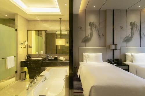 Koupelna v ubytování Maanshan Wanda Realm Hotel