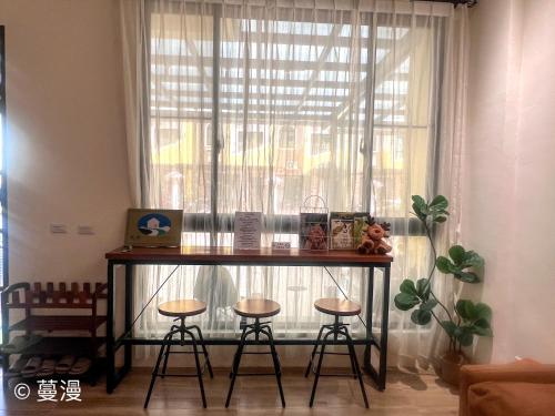 Un lugar para sentarse en Manman Homestay
