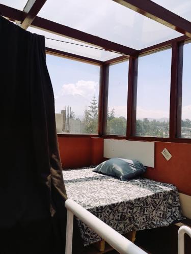 Postel nebo postele na pokoji v ubytování Bungalow Casa Junto al Rio