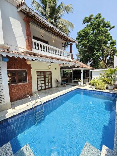 Bazén v ubytování OV Private Pool Villas near Baga, I 4BHK units I Staff nebo v jeho okolí