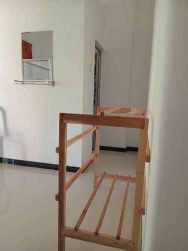 a ladder in the corner of a room at Sarasvi in Dickwella