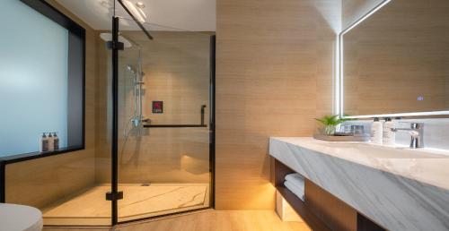 Koupelna v ubytování Wanda Jin Hotel Karamay Dushanzi Huiyang