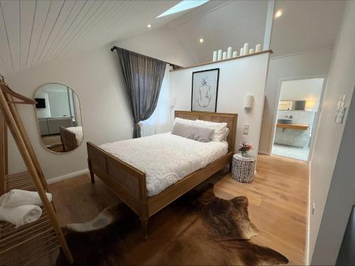 Ένα ή περισσότερα κρεβάτια σε δωμάτιο στο Tea Gardens Loft