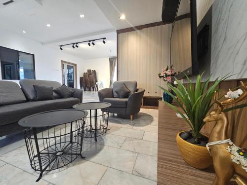 Χώρος καθιστικού στο Melody Whole Or Suite Room