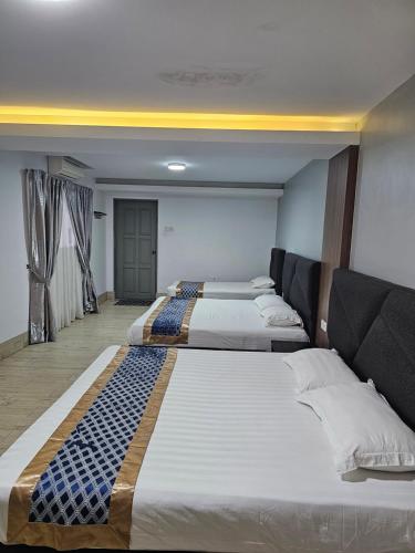 Ένα ή περισσότερα κρεβάτια σε δωμάτιο στο Melody Whole Or Suite Room