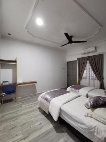 Ένα ή περισσότερα κρεβάτια σε δωμάτιο στο Melody Whole Or Suite Room