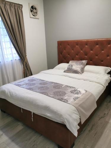 Ένα ή περισσότερα κρεβάτια σε δωμάτιο στο Melody Whole Or Suite Room