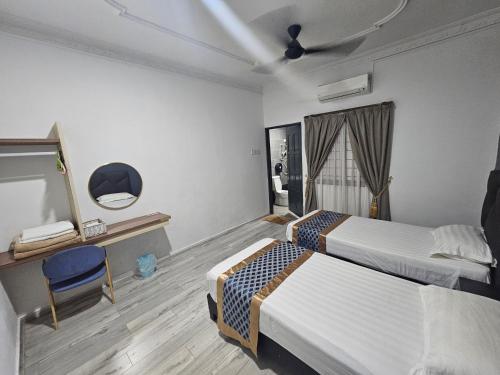 Postel nebo postele na pokoji v ubytování Melody Whole Or Suite Room