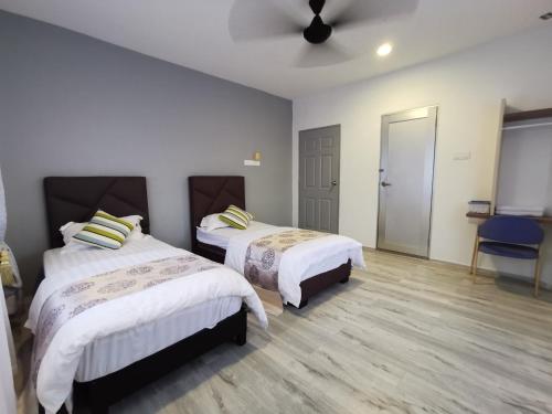 Ένα ή περισσότερα κρεβάτια σε δωμάτιο στο Melody Whole Or Suite Room